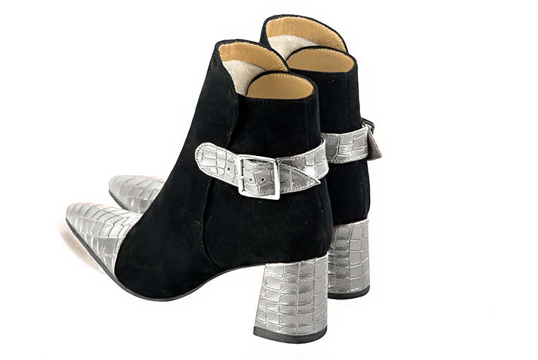 Light silver and matt black women's ankle boots with buckles at the back. Tapered toe. Medium flare heels. Rear view - Florence KOOIJMAN
